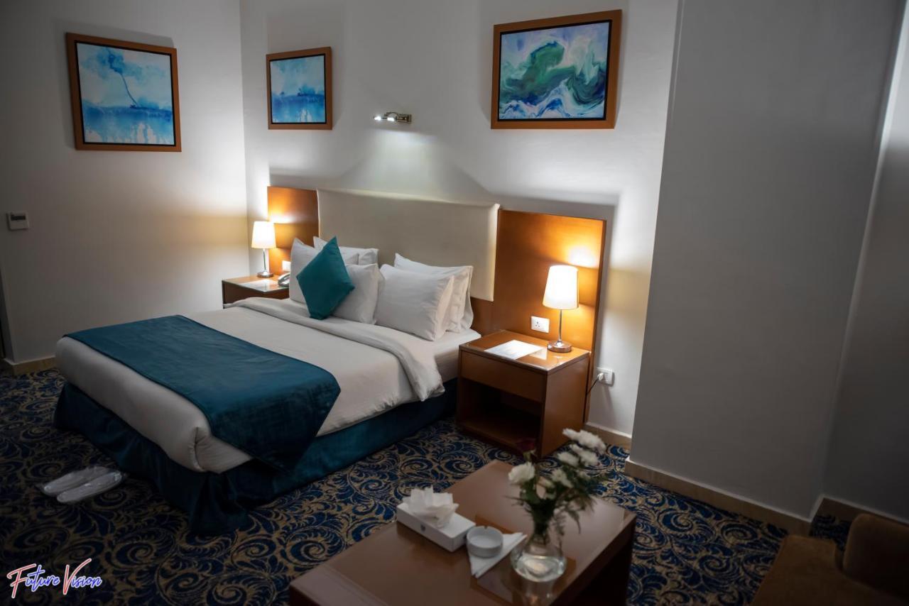 Rehana Plaza Hotel Kairo Bagian luar foto A room at the hotel